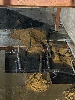 basement lavatory pipes ready for inspection